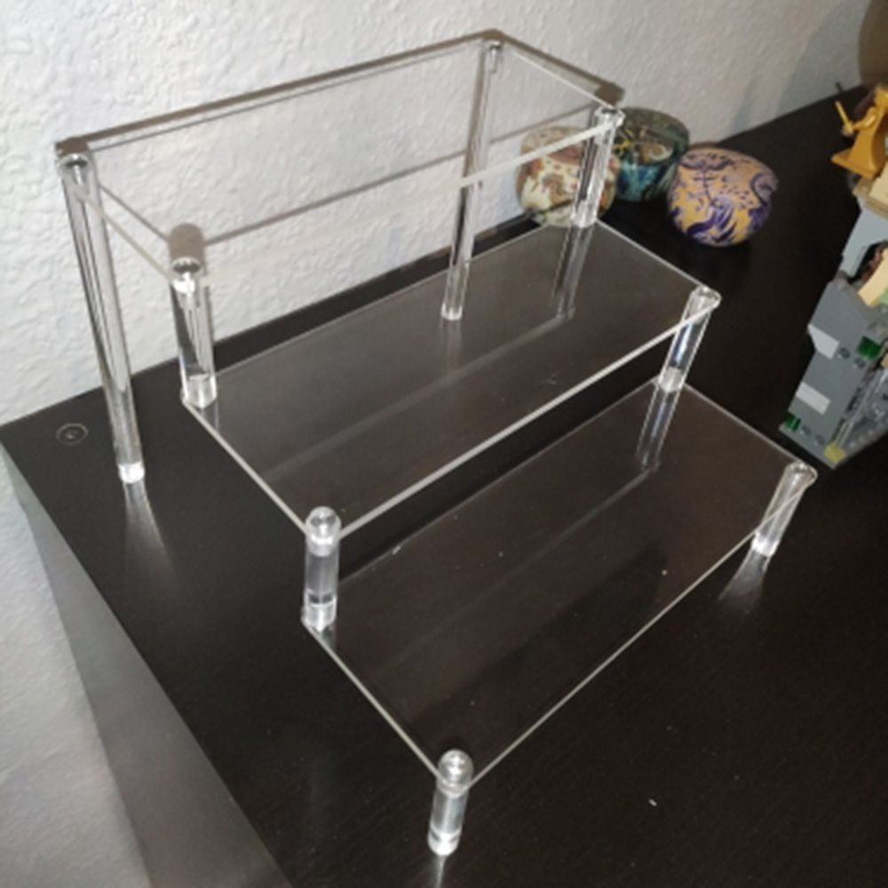 Soporte de exhibición acrílico de 1-4 niveles, estante de exhibición duradero para magdalenas, Perfume, muñeca, caja ciega Trapezoidal transparente, estante de almacenamiento