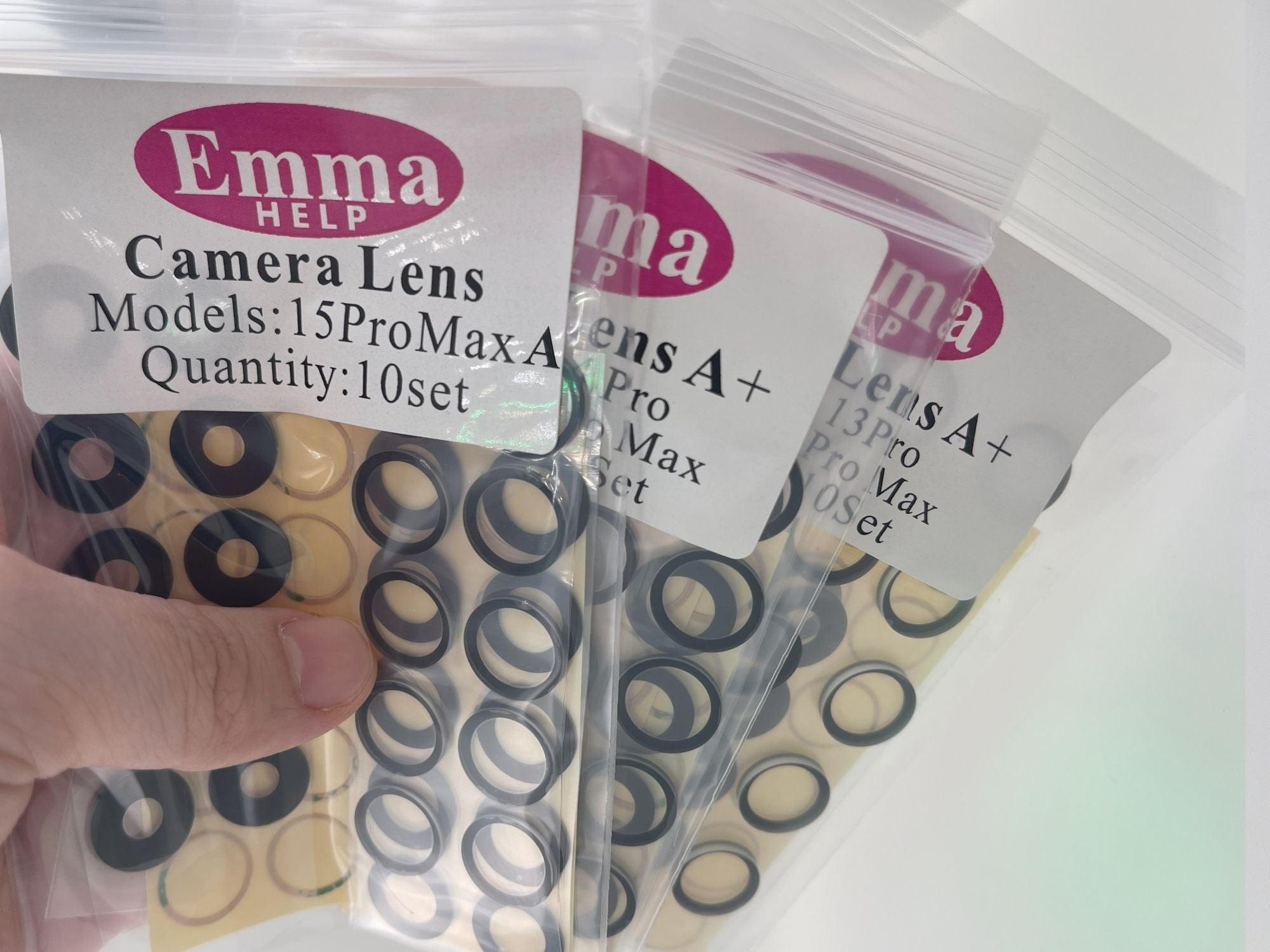 EmmaHelp Juego de 10 cristales de repuesto para cámara trasera de iPhone 15 14 13 XR X XS SE 7 8 11 12 Pro Max, cubierta de lente de cámara trasera, adhesivo de repuesto A+
